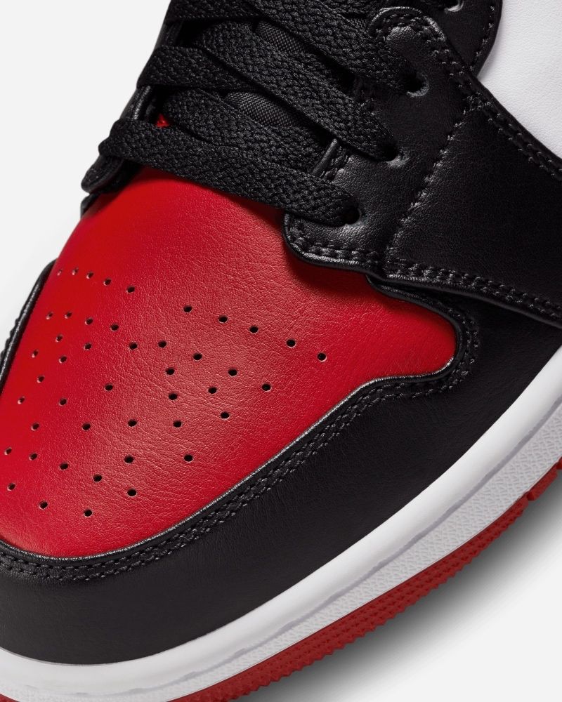 Chaussures Nike Air Jordan 1 Low Blanc/Noir/Rouge pour homme