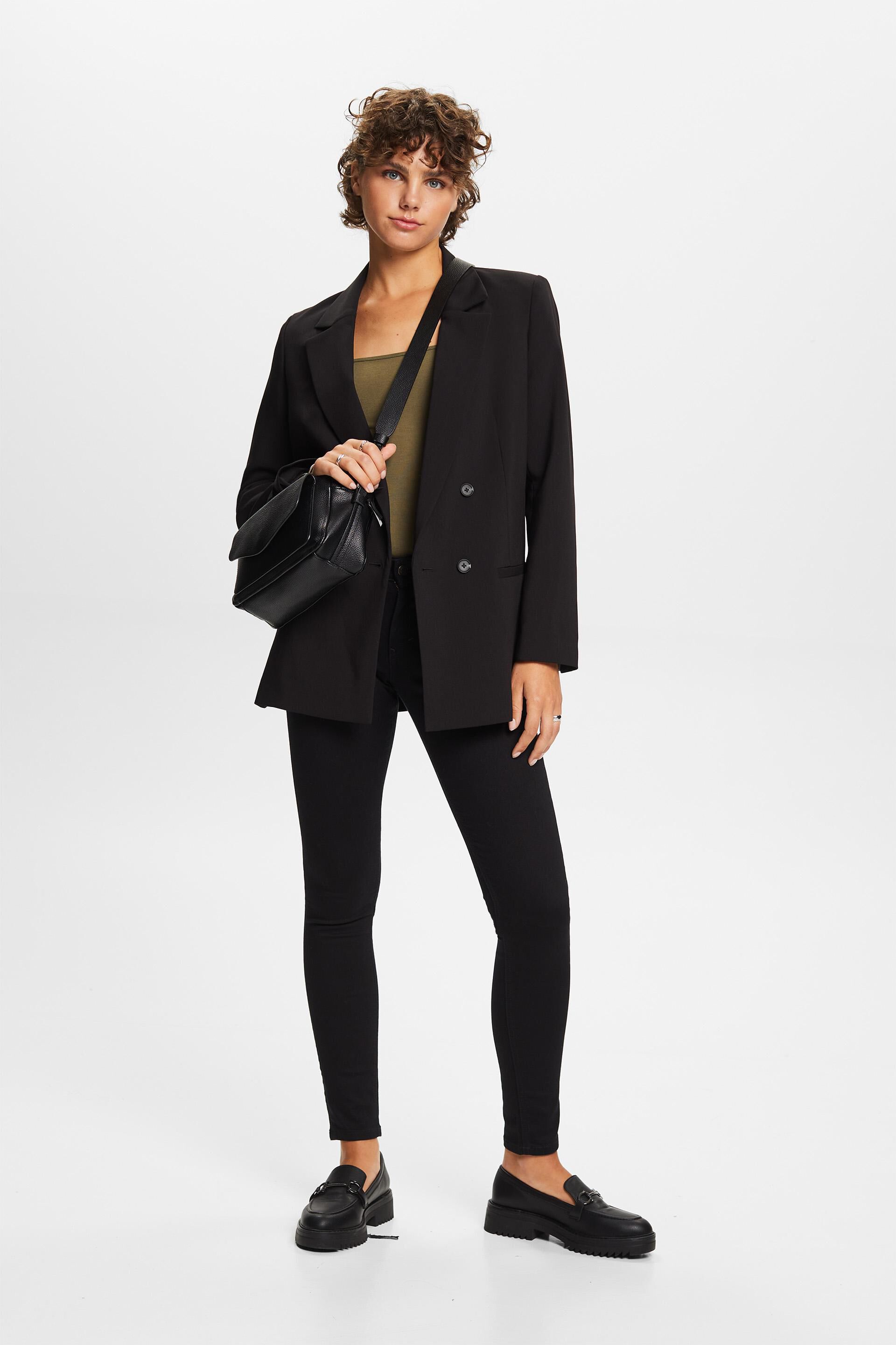 En matière recyclée : jean stretch de coupe Skinny Fit taille mi-haute