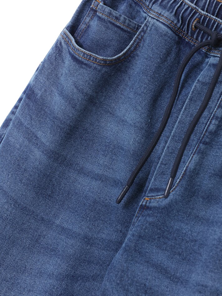 Calça jeans jogger elástica - Azul escuro