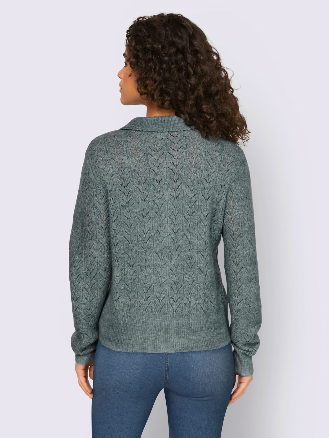Veste en tricot motif ajouré transparent discret
