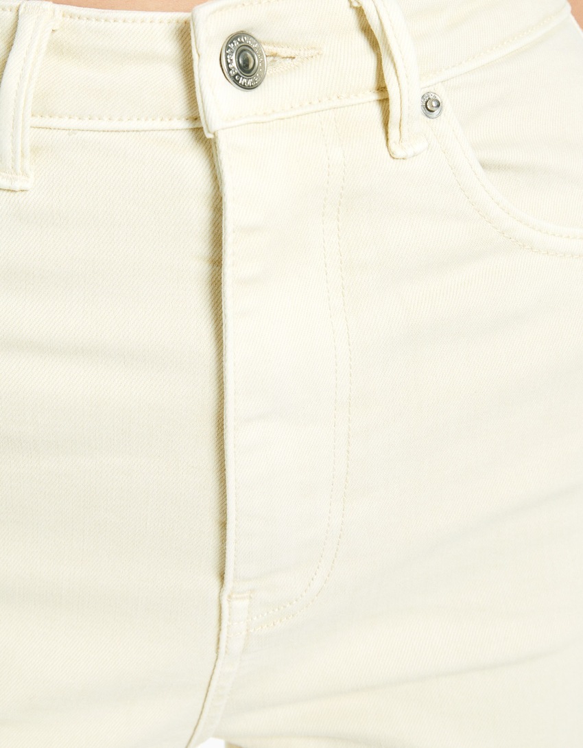 calça jeans skinny de cintura super alta