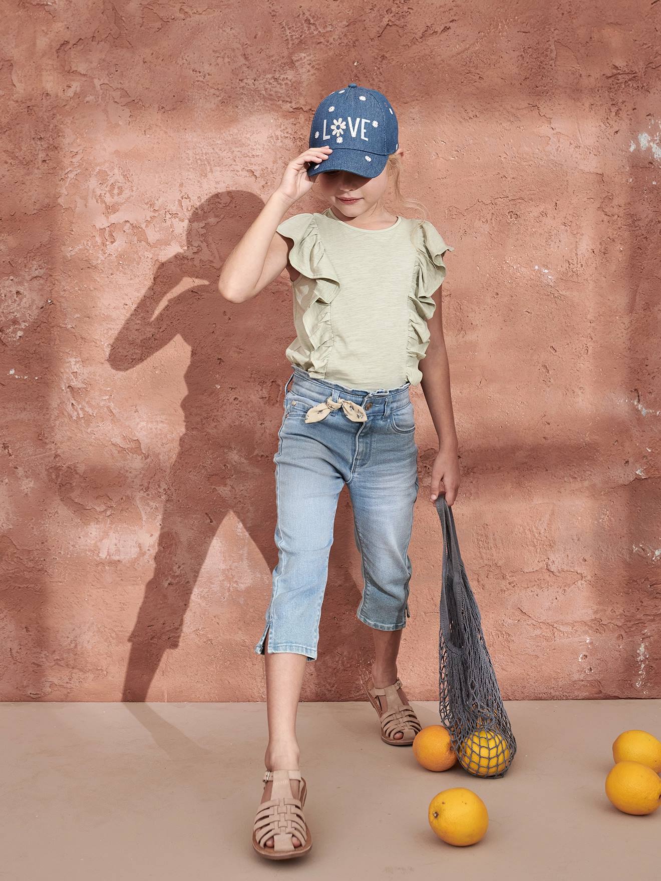 Calça jeans cropped feminina Double Stone com laços.