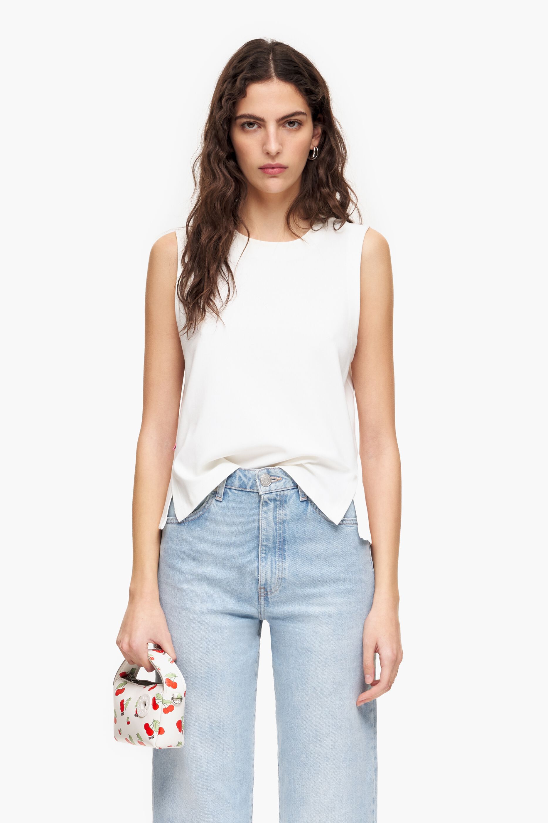 blusa sem mangas cor marfim