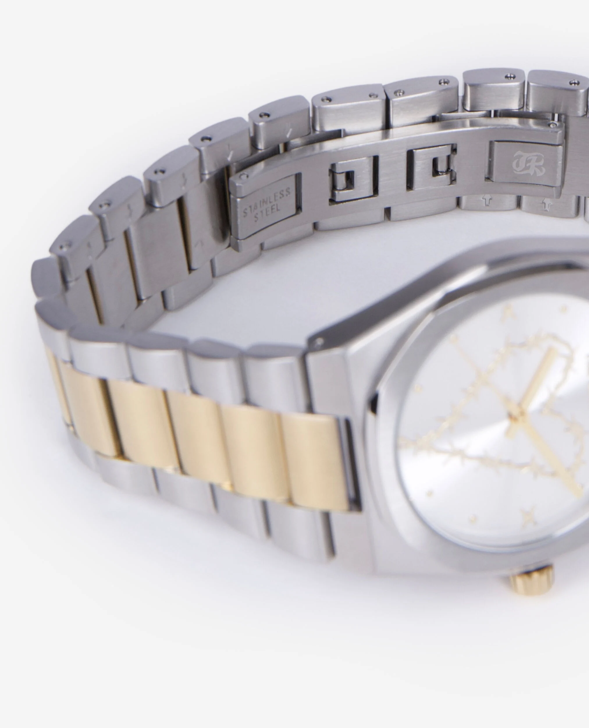 Montre avec coeur dorée et argentée