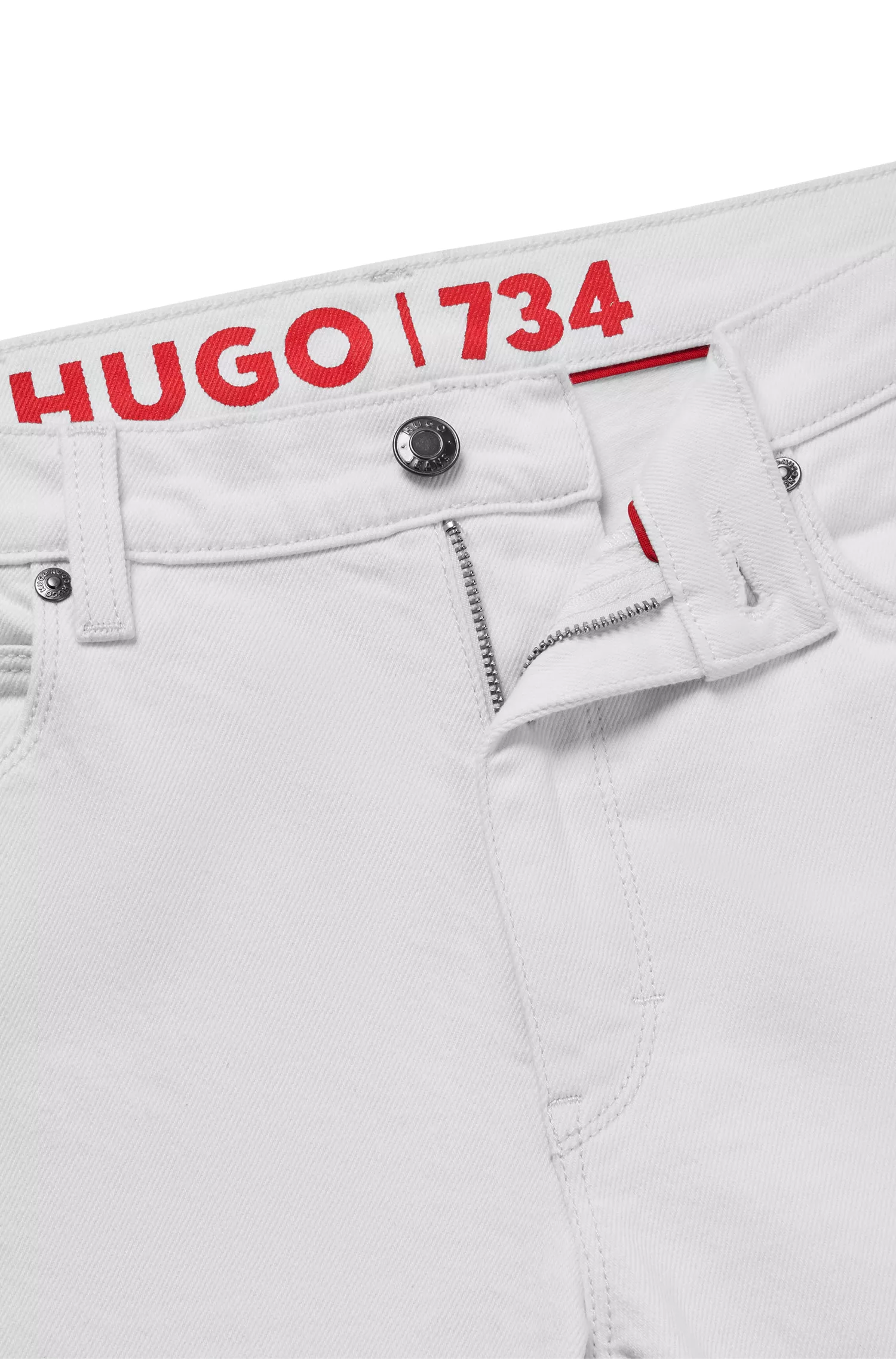 Calça jeans HUGO vermelha, extra slim fit, em denim branco com elasticidade confortável.