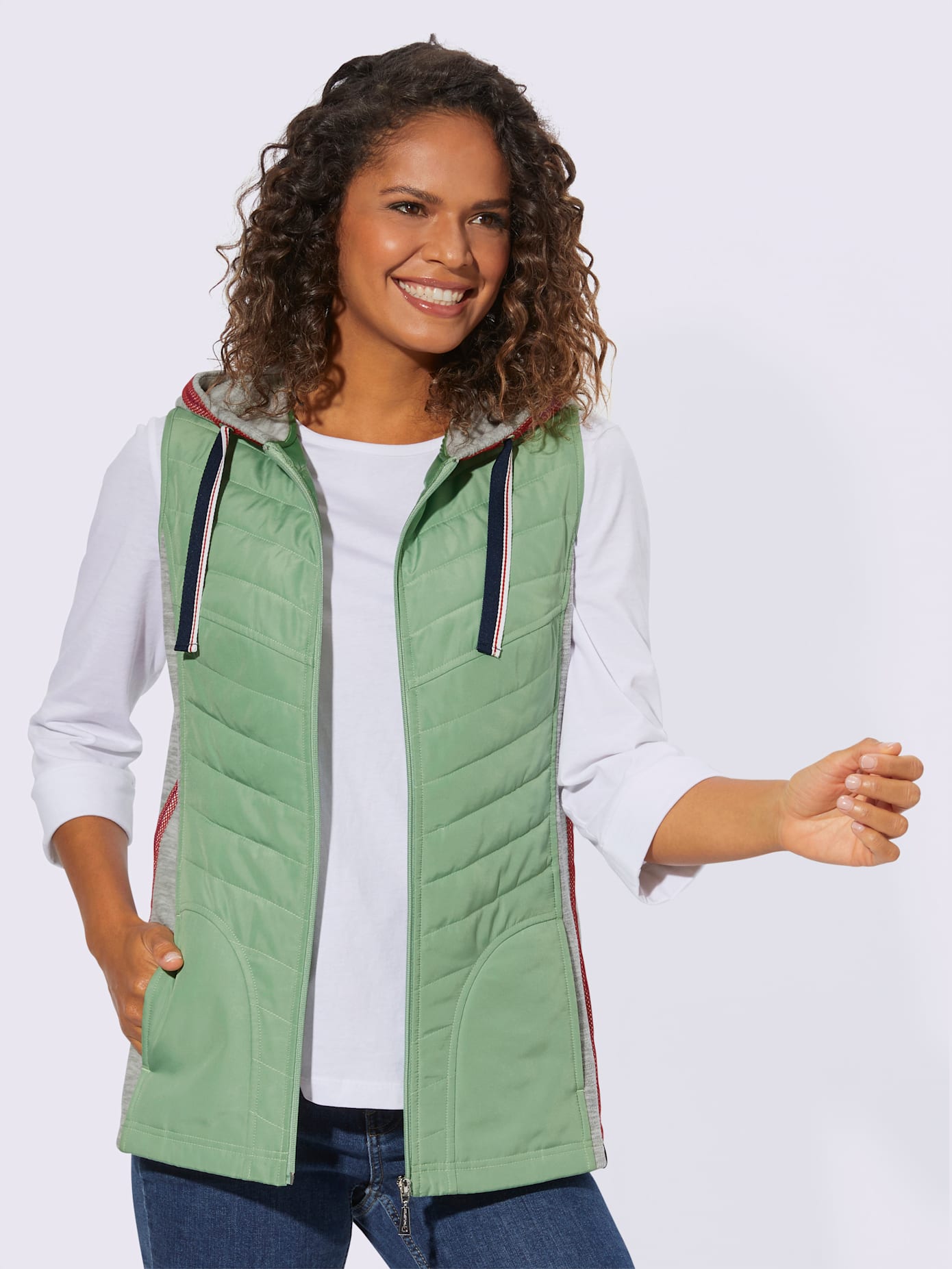Gilet capuche avec coulisse et lien à nouer