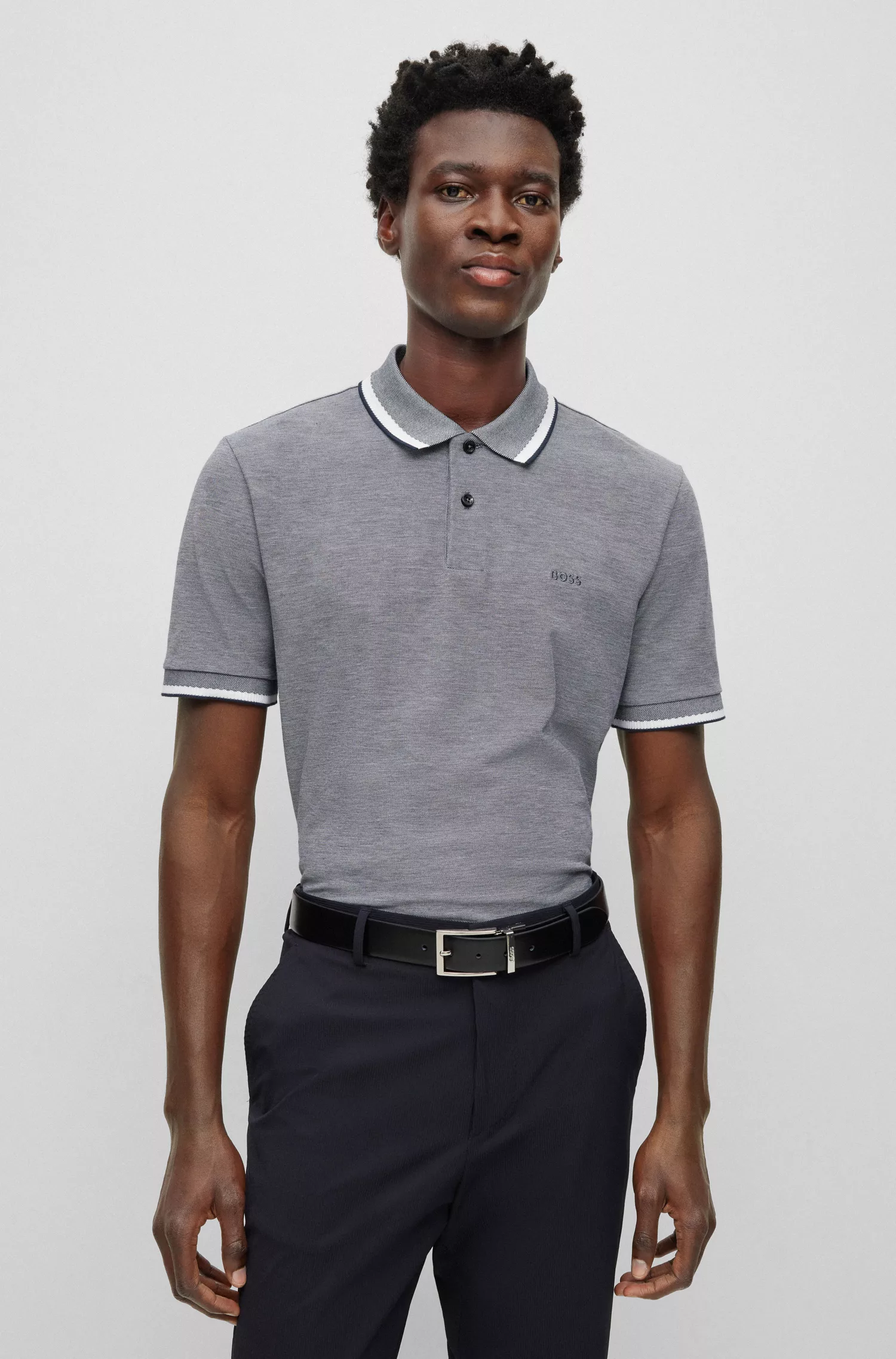 Camisa polo BOSS preta em piqué de algodão com logotipo bordado.