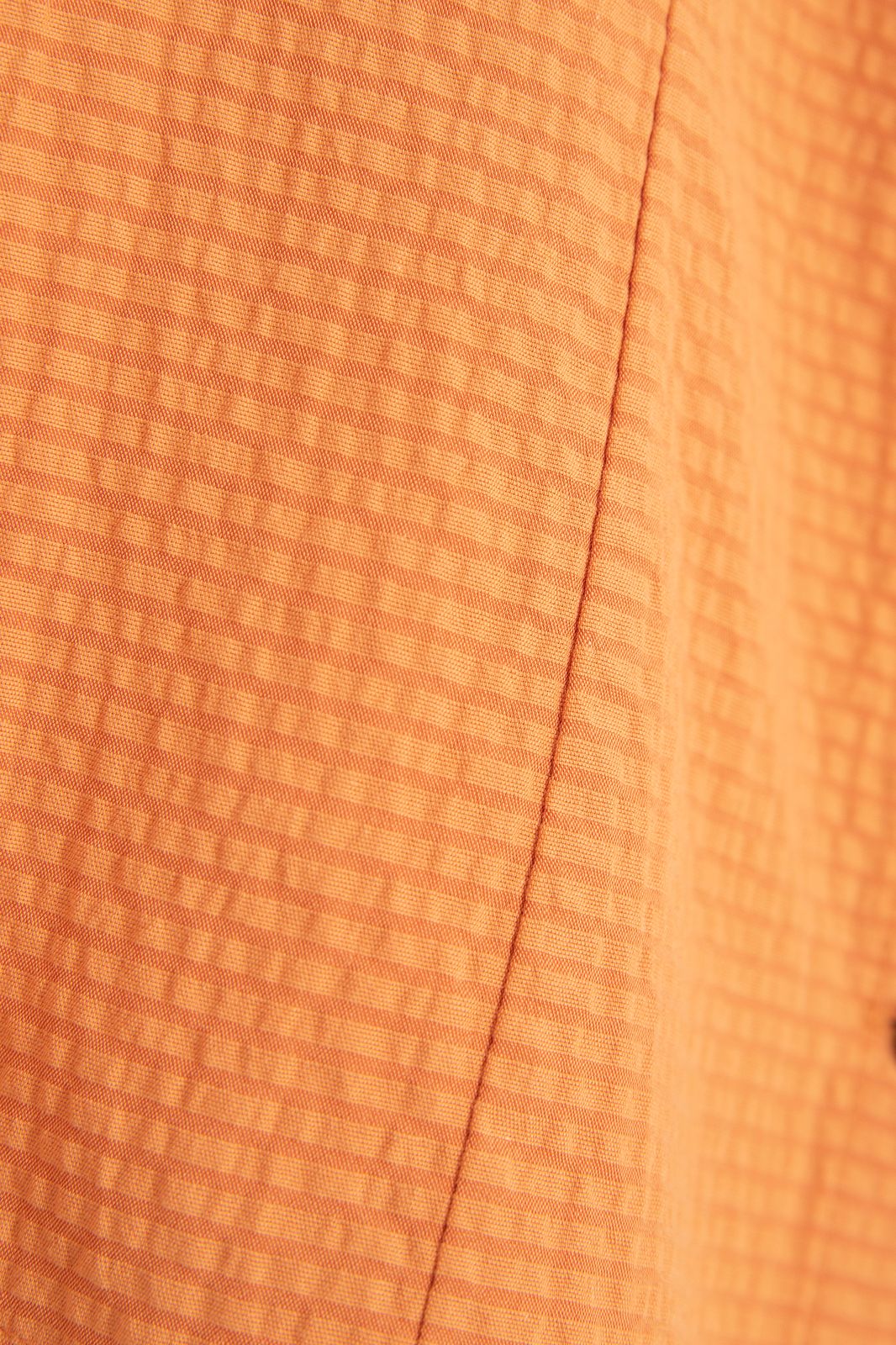 Oranje blouse met pofmouwen