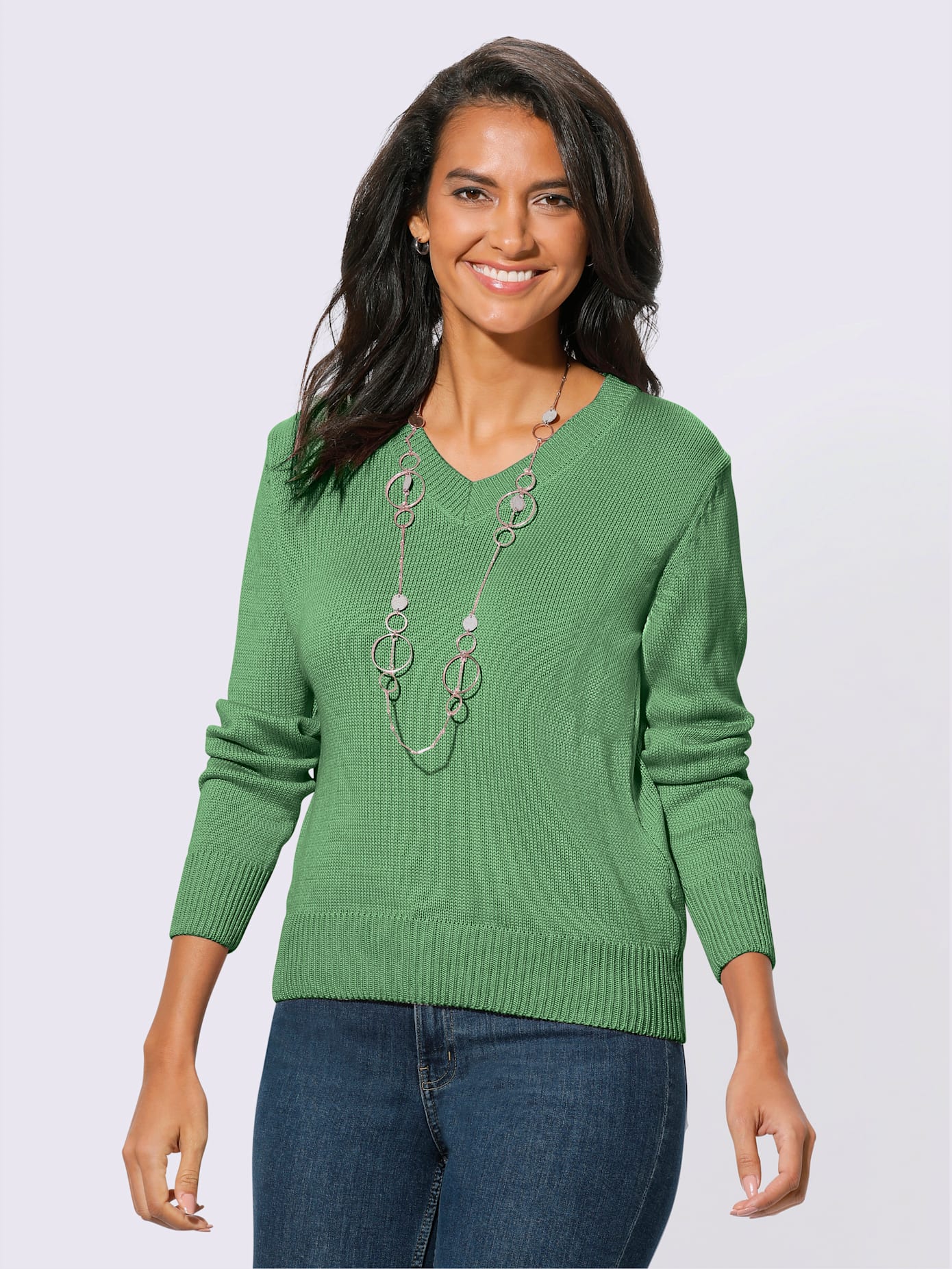 Pull femme coupe classique col en v finitions côtelées