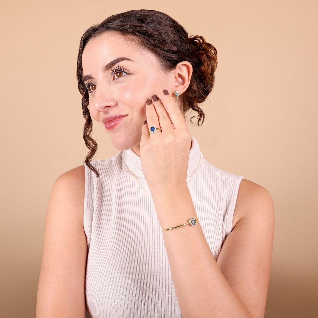 Damenring 750/18 K Gelbgold mit Saphir und Zirkonia