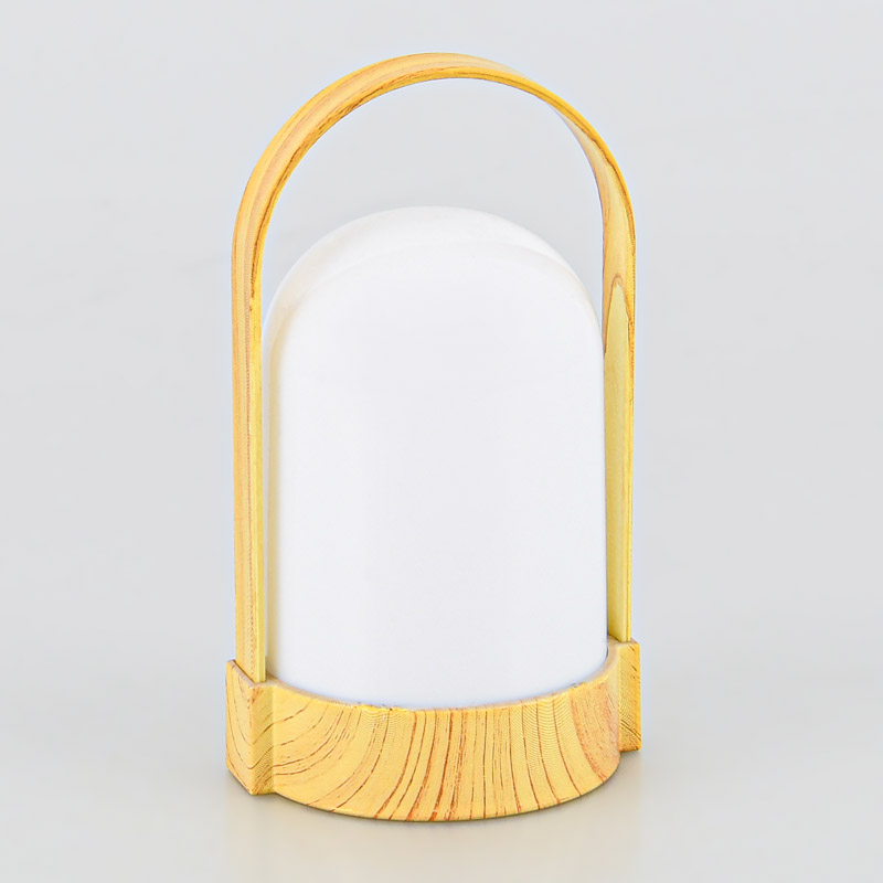 Lampe à poser avec poignée