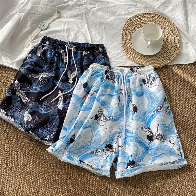 Acrius - Shorts met trekkoord in de taille en tropische print