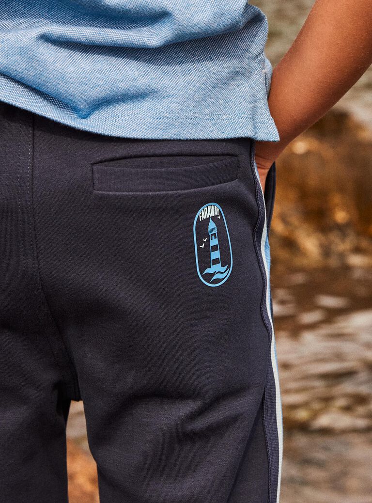 Pantalon bleu marine à bandes contrastantes