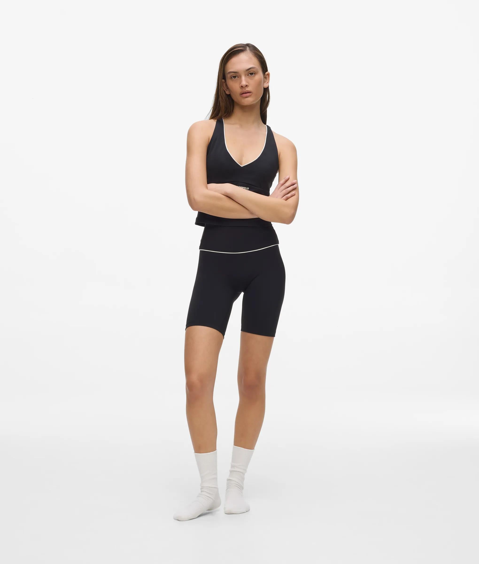 Athleisure korte broek met contrastbiesen