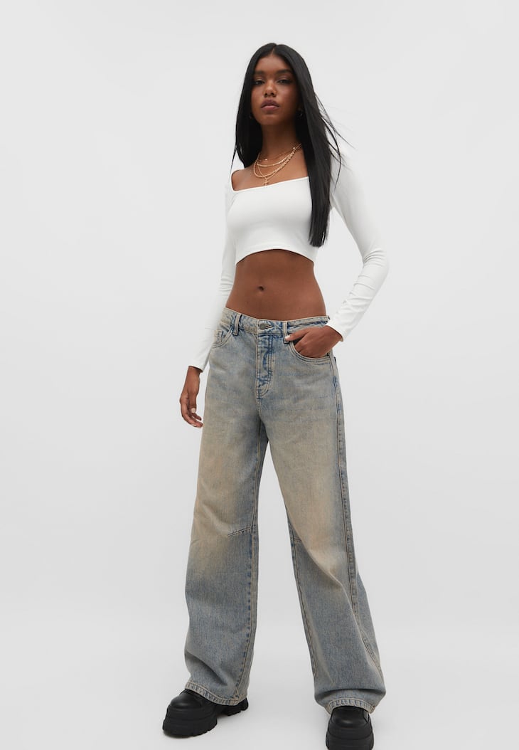 calças jeans largas ajustáveis