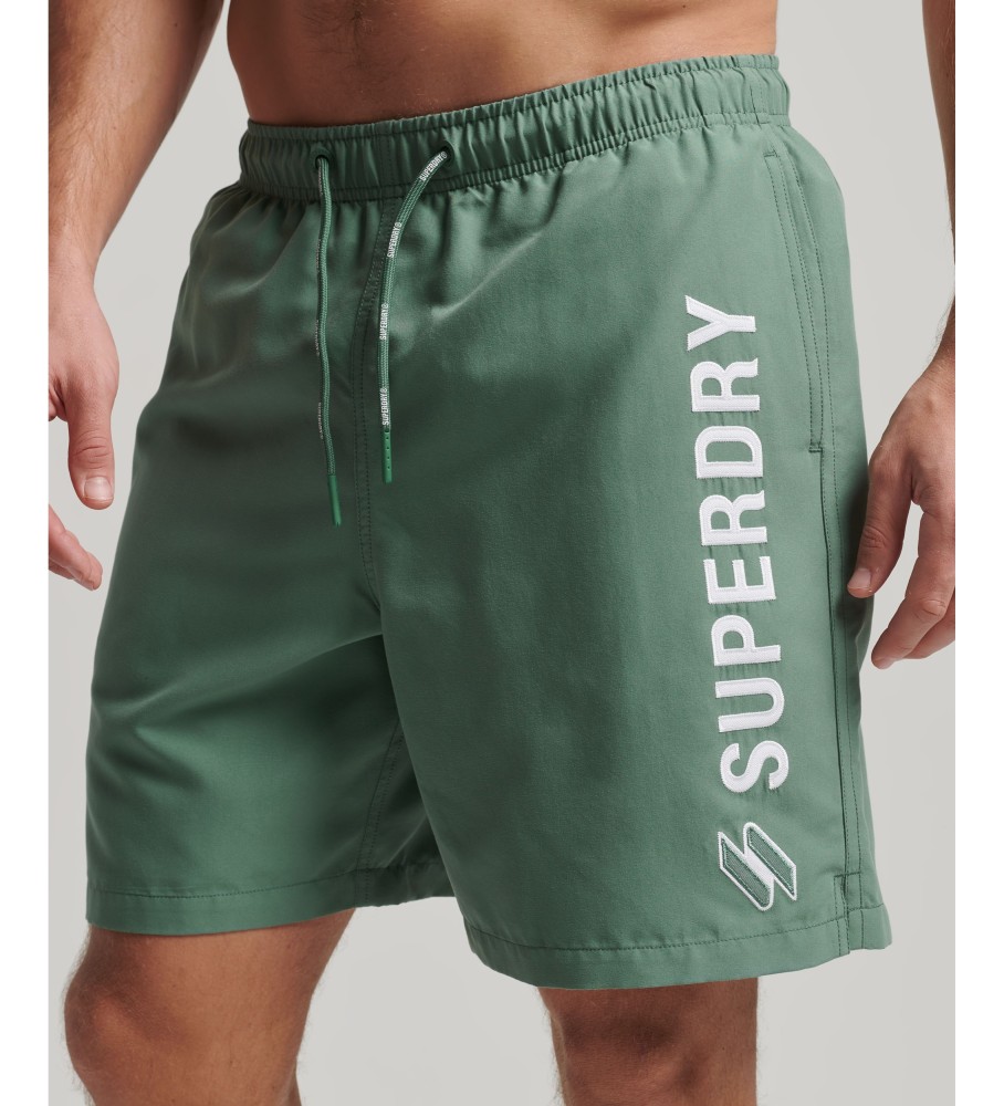Maiô Superdry tamanho 48cm com apliques, confeccionado em material reciclado ecológico.