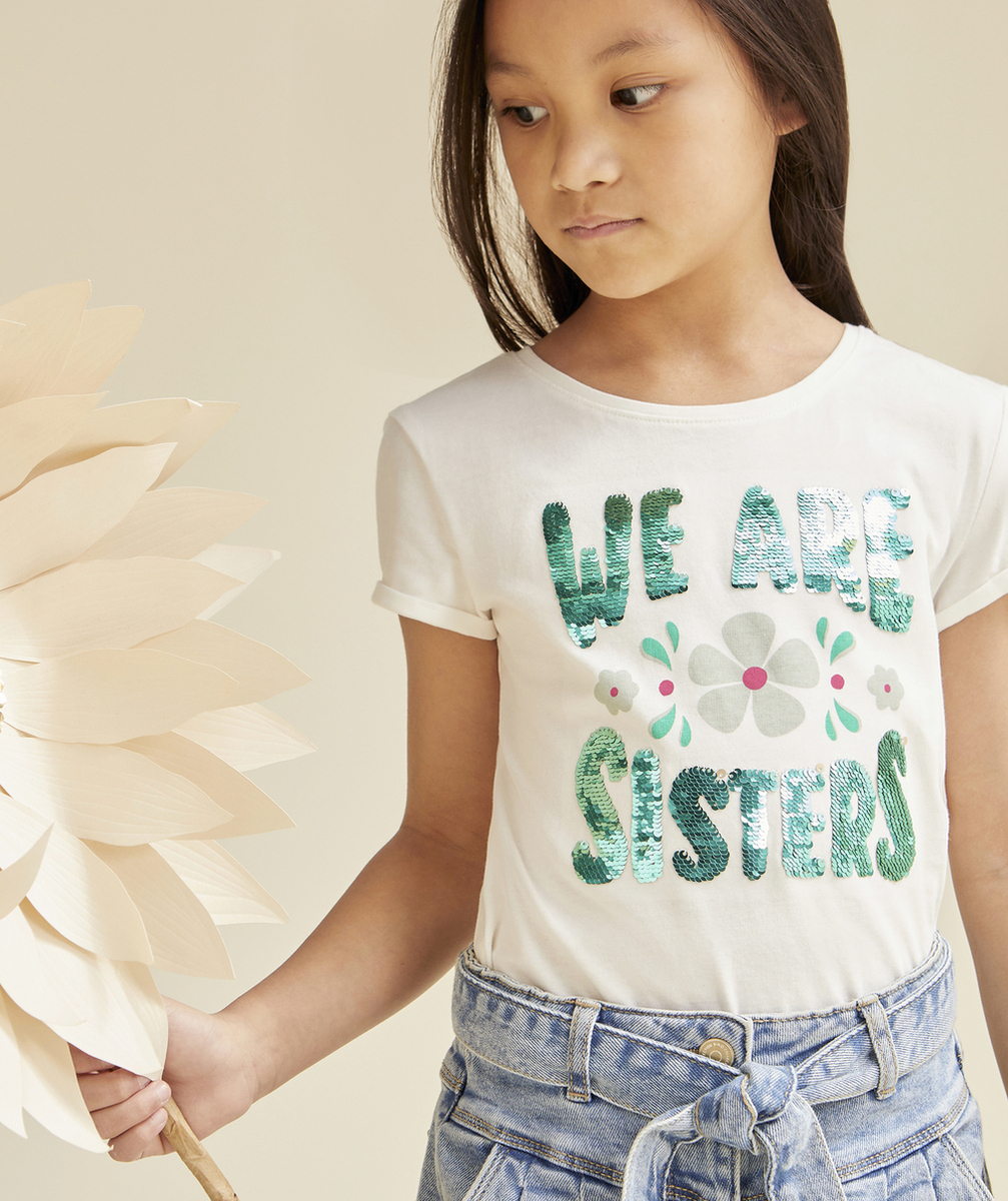 T-SHIRT FILLE EN COTON BIO BLANC AVEC MESSAGE EN SEQUINS RÉVERSIBLES