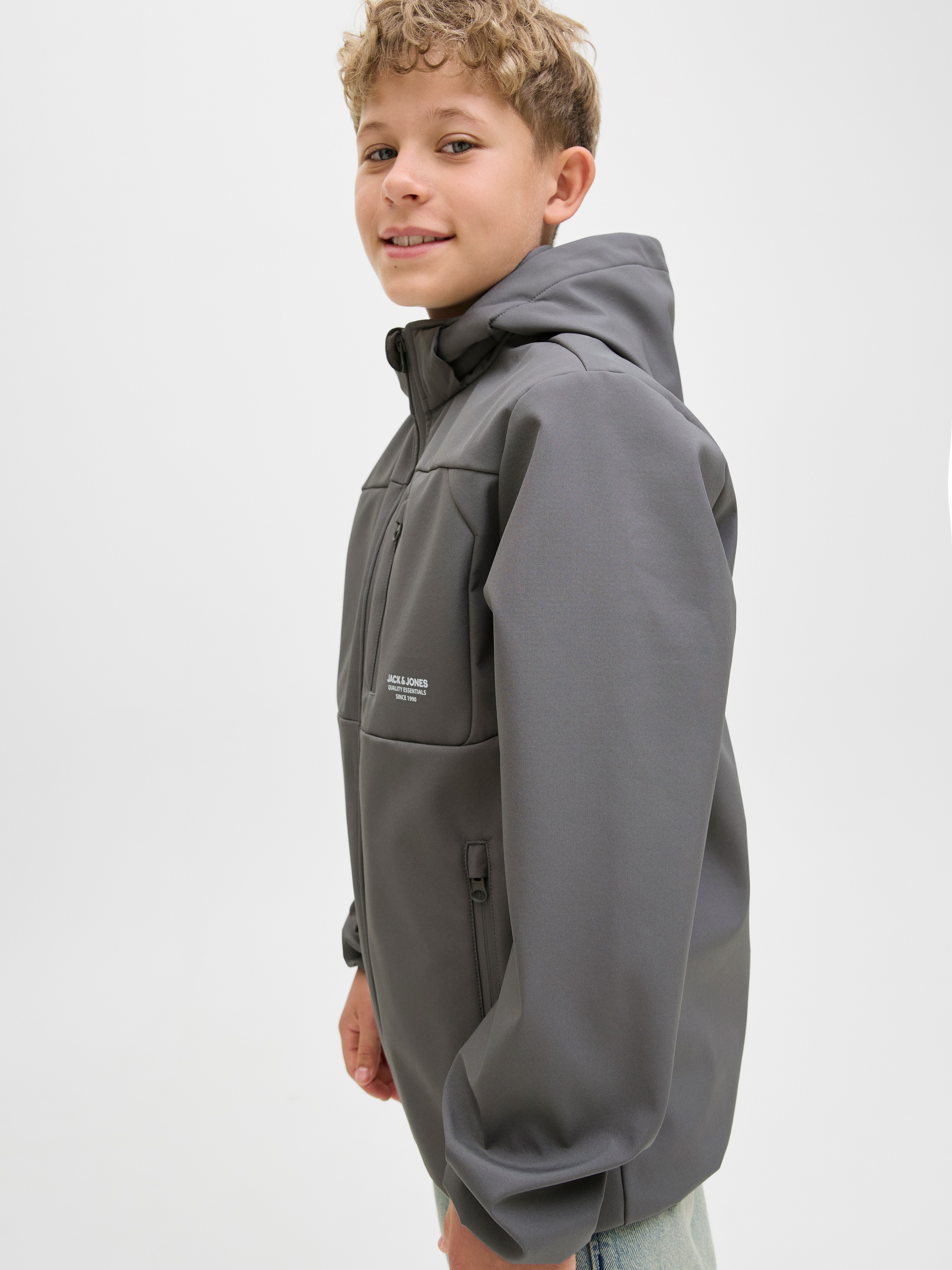 Jack & Jones Junior Softshelljacke »JJTHEO wasserabweisend und pflegeleicht für Alltag« mit Kapuze unifarben, modisch, regular fit, Web, Kapuze