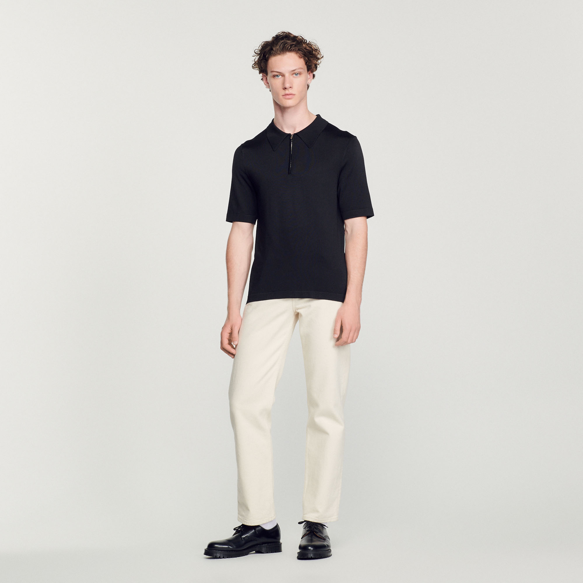 Polo en maille á col zippe