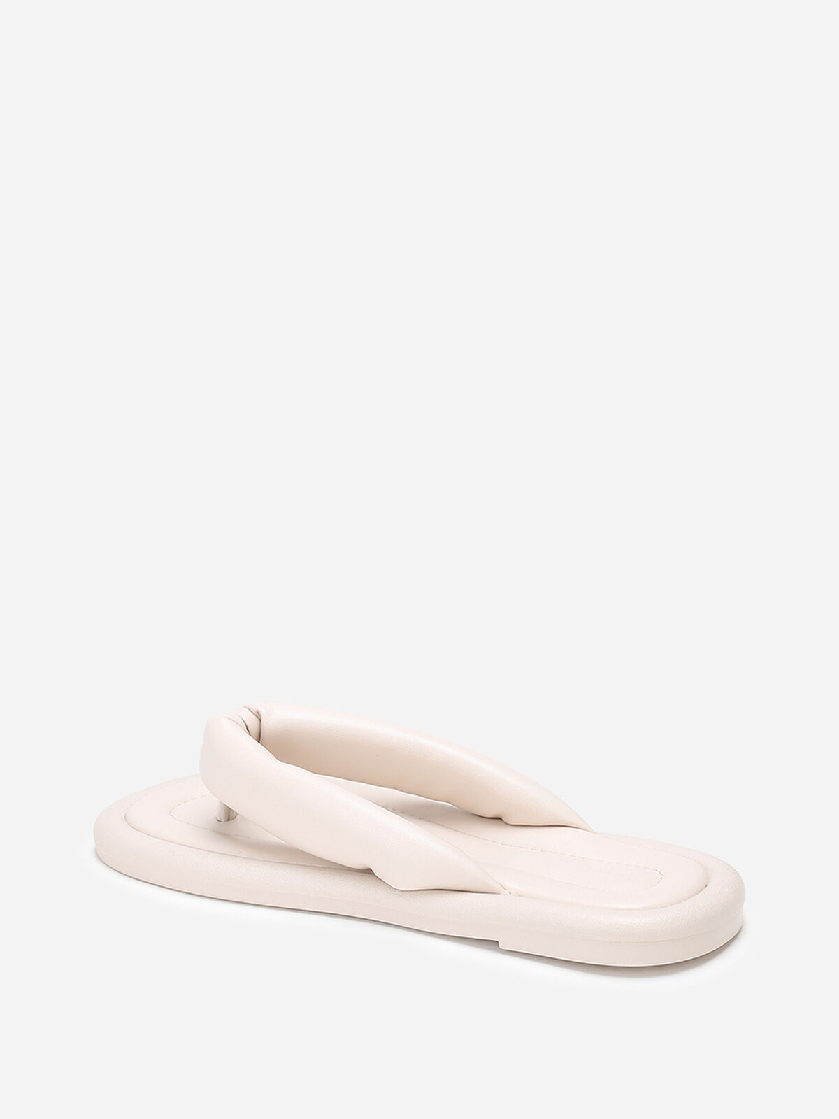 Tongs en simili à bride arrondie et matelassée- Beige