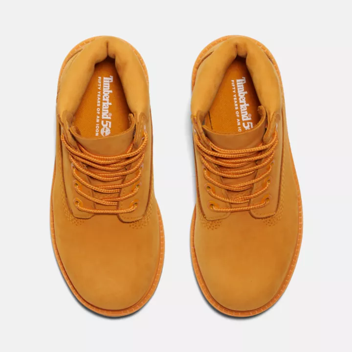 Bota Timberland Premium de 6 polegadas, impermeável, edição 50, para crianças pequenas, na cor laranja.