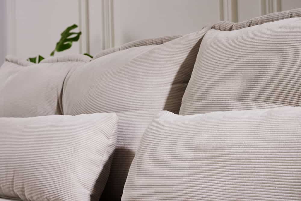 Modernes Ecksofa DESIGNO 250cm champagner beige Cord Couch inklusive Kissen Metallfüße