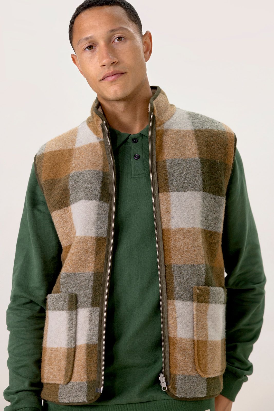 Groen geblokte reversible teddy bodywarmer