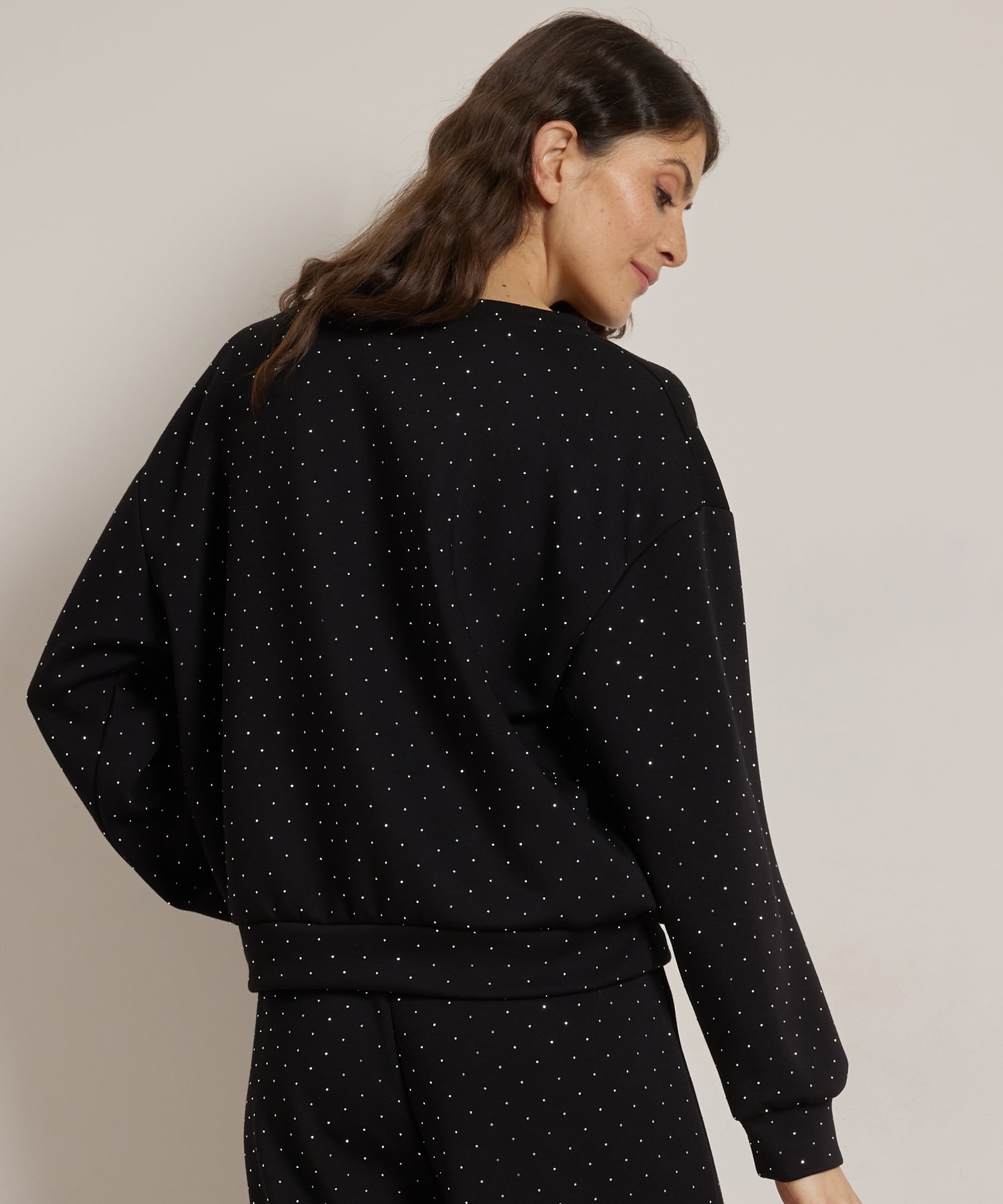 glitter trui mouwlabel