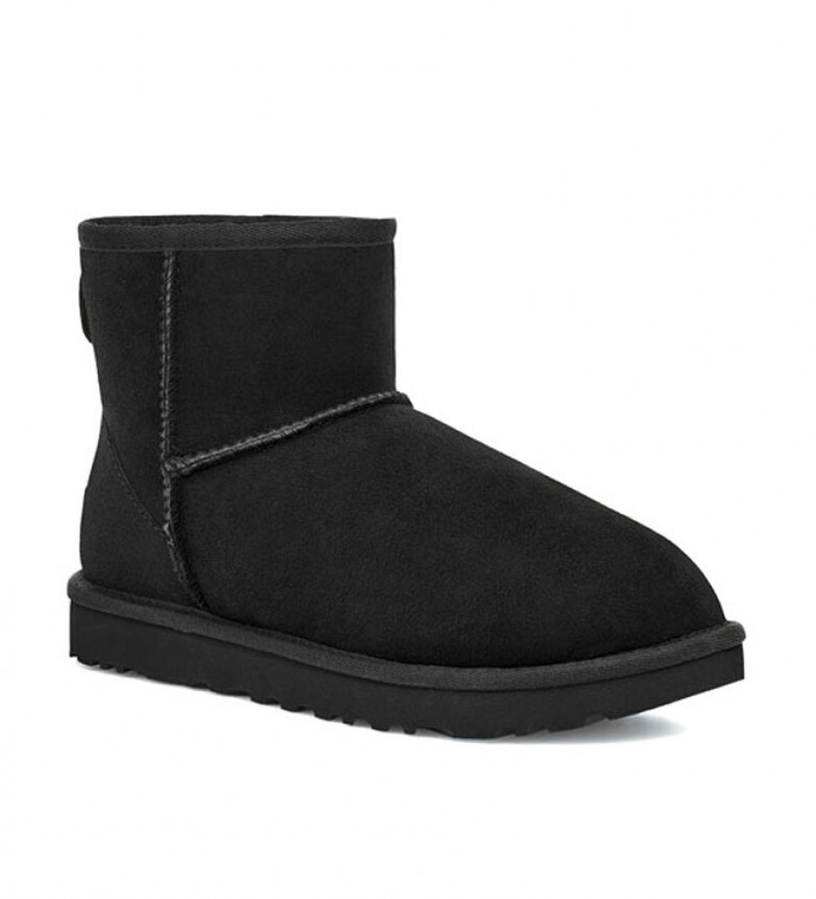 Botas de cano curto UGG Classic Mini II em couro, pretas