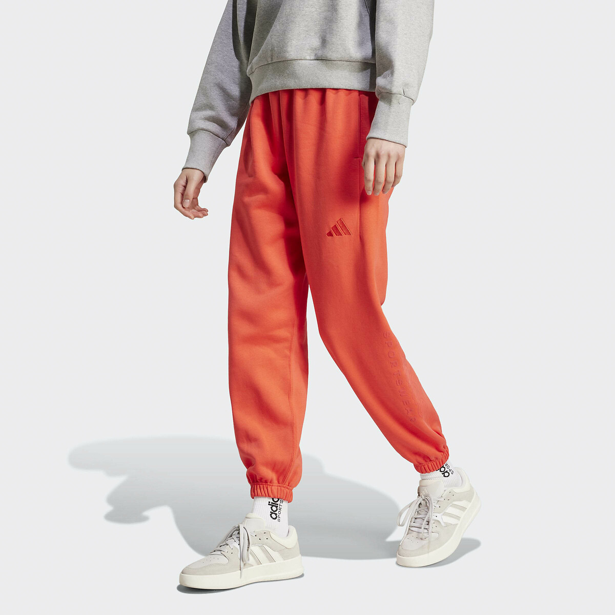 ADIDAS ROUPAS ESPORTIVAS<br>Calça de corrida larga com estampa para todas as estações