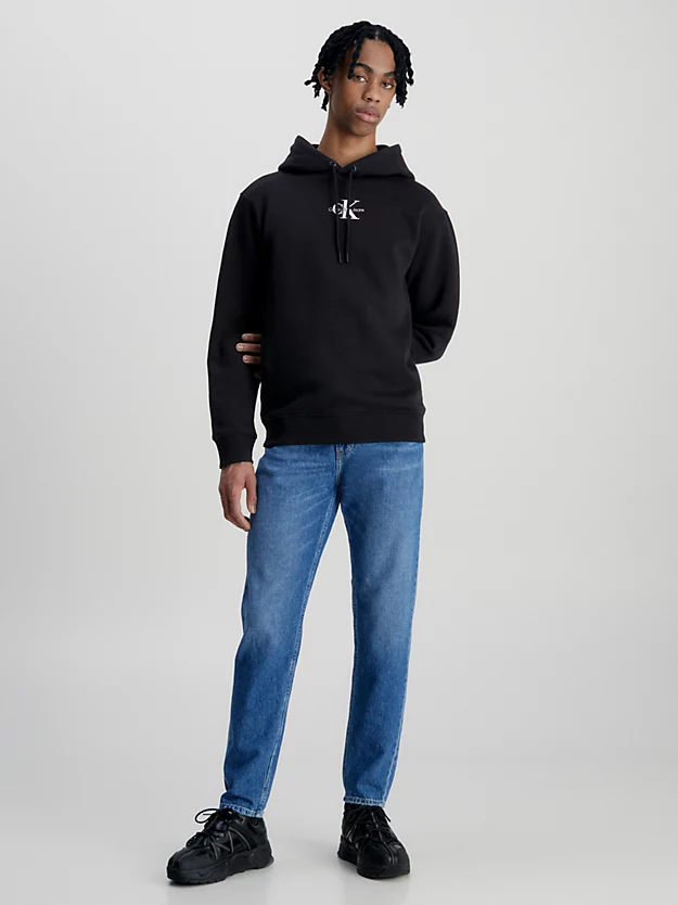 Calça jeans afunilada