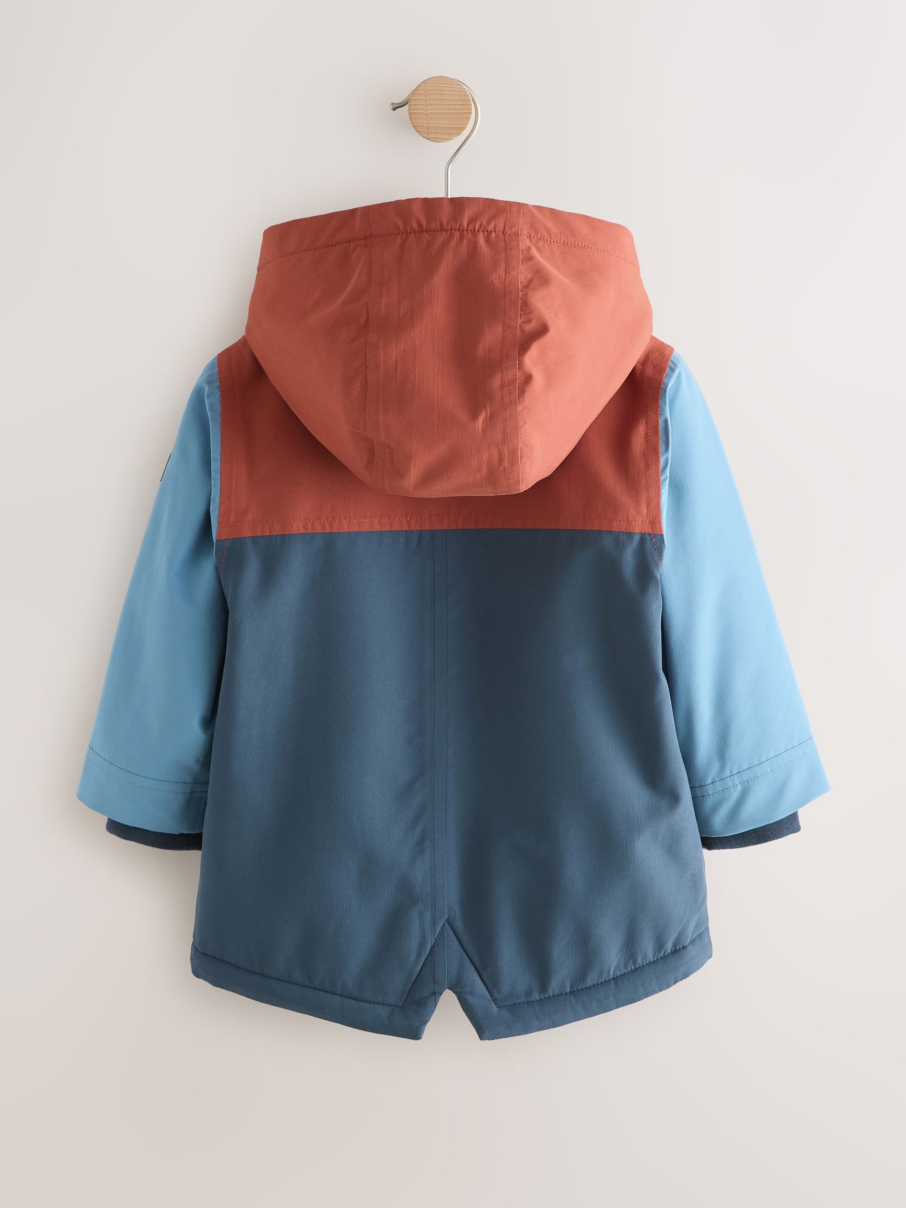 Marineblauw/rood met kleurvlakken - Waterdichte parka met borgvoering (3mnd -7jr)