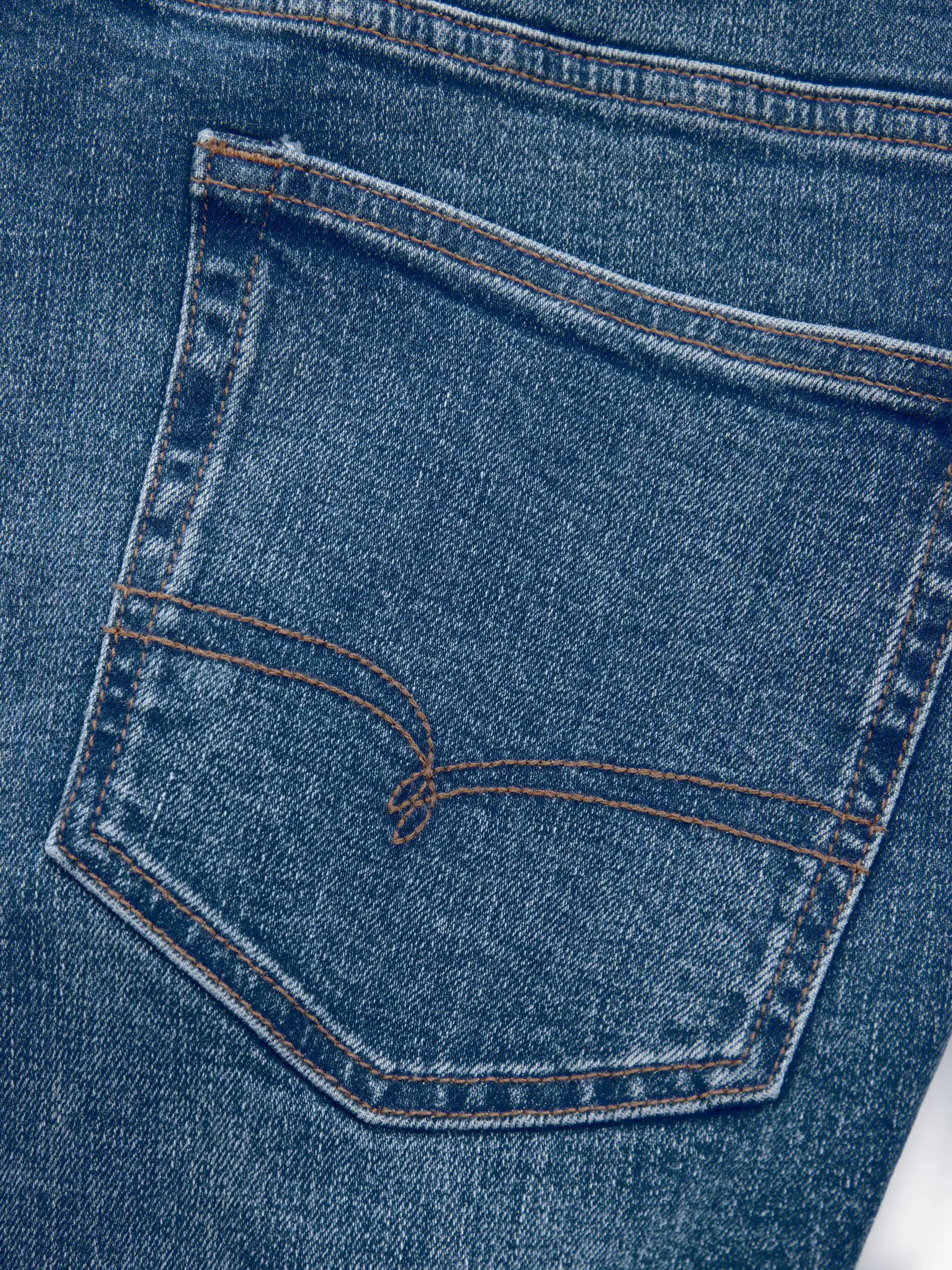 Mediumblauw - Standaard toelopende pasvorm - Vintage wash denim jeans