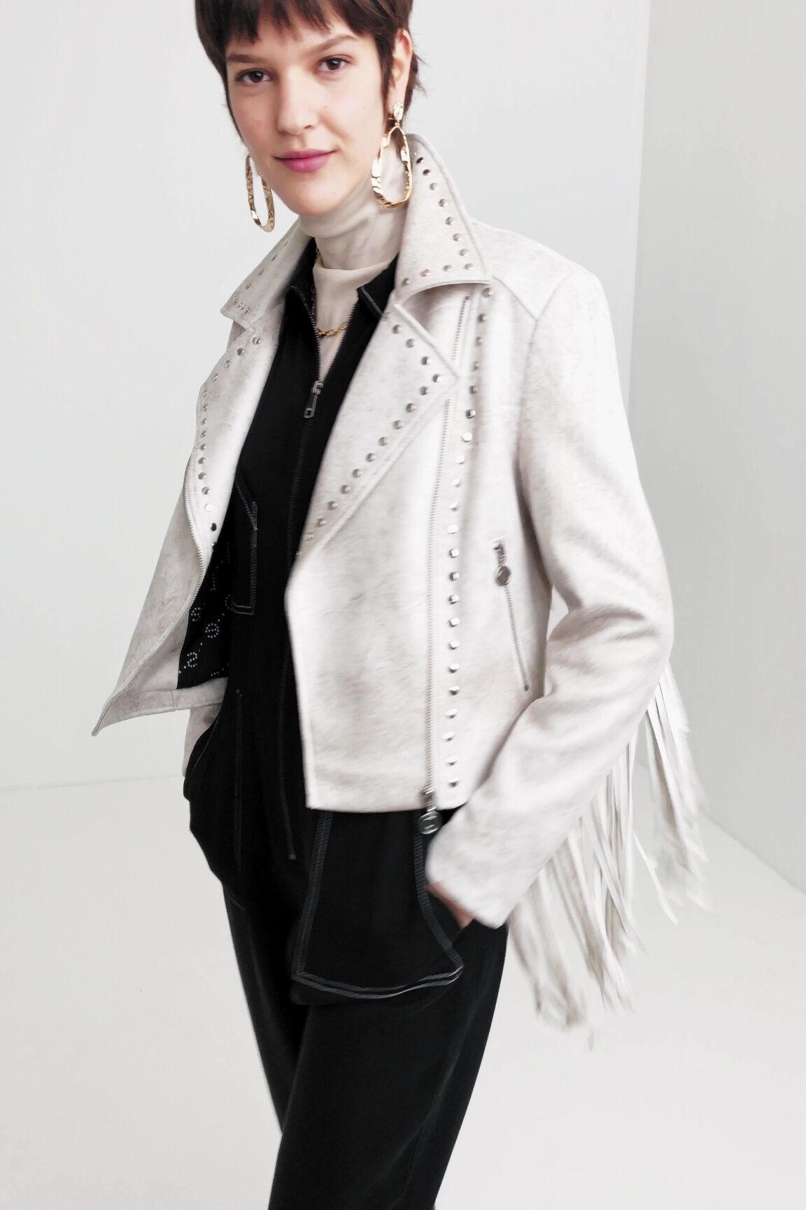Veste motarde à franges et clous