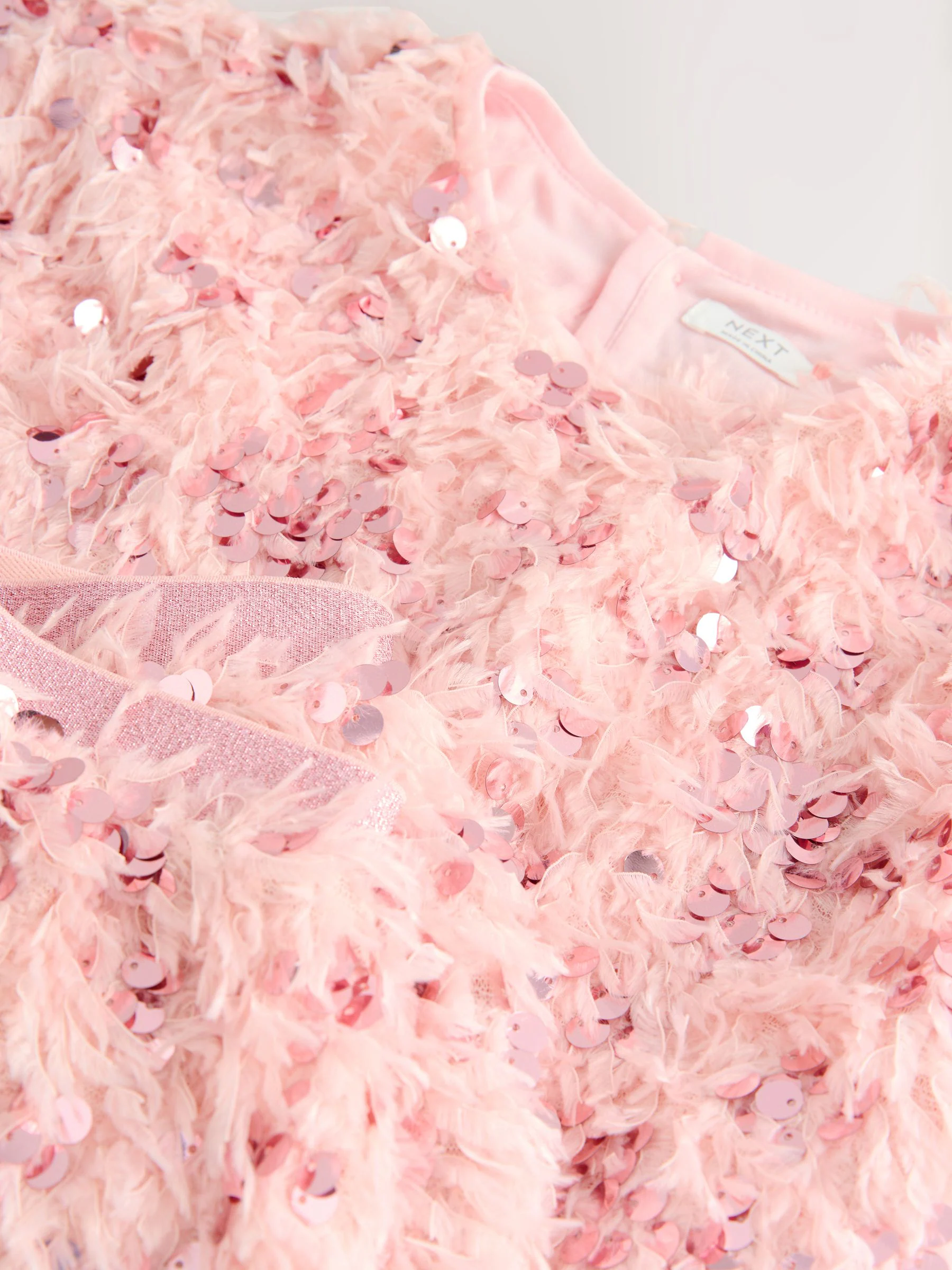 Roze pluizige Pailletten - Set van T-shirt en rok (3-16jr)