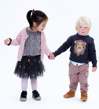 Hust and Claire Rock - Naina - Braun