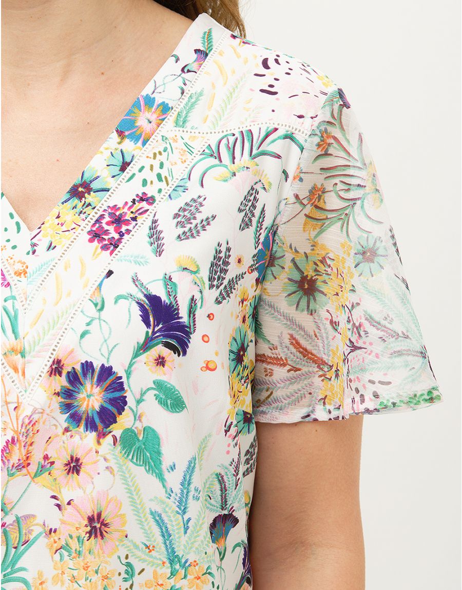 Robe chic blanche motifs