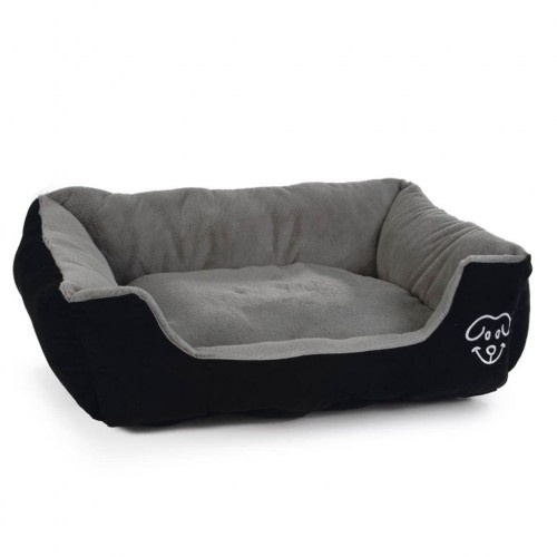 Cama de pelúcia macia para cães na cor cinza.