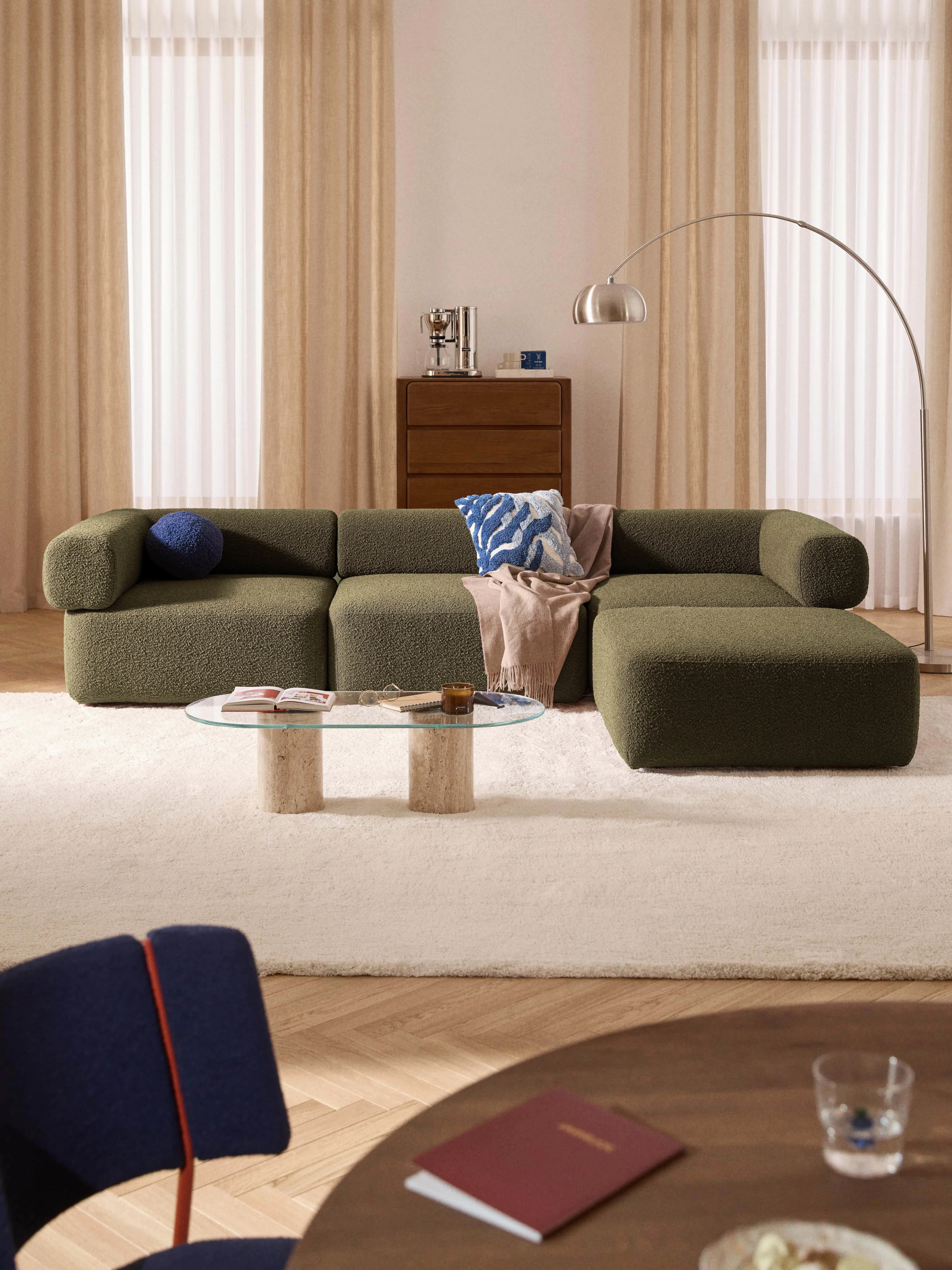 Modulaire bank Anton (4-zits) met poef (links/rechts) van bouclé