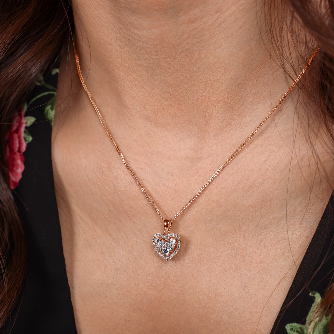 Anhänger 750/18 K Roségold Herz mit Diamanten 0.51 ct H/si