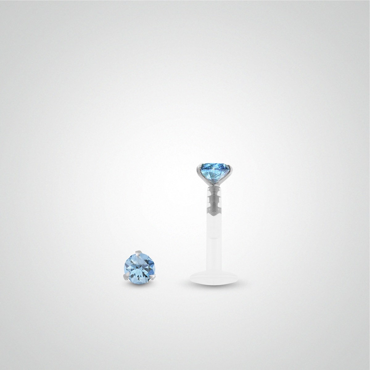 Piercing anti-hélix : or blanc avec oxyde de zirconium bleu clair 2,5mm