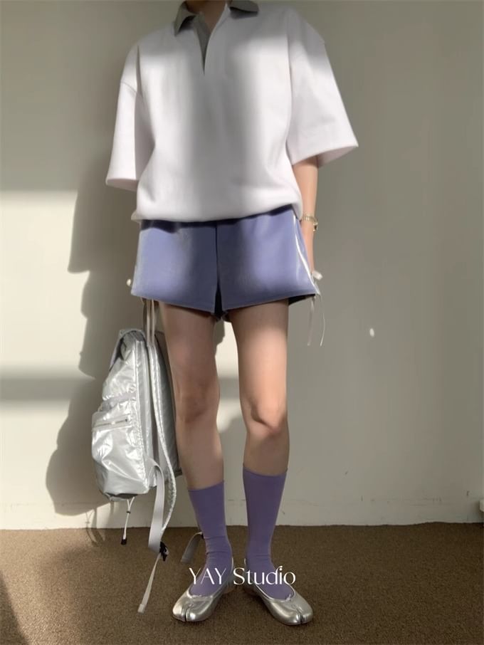 Alfie - Mid Rise gestreepte shorts met strik