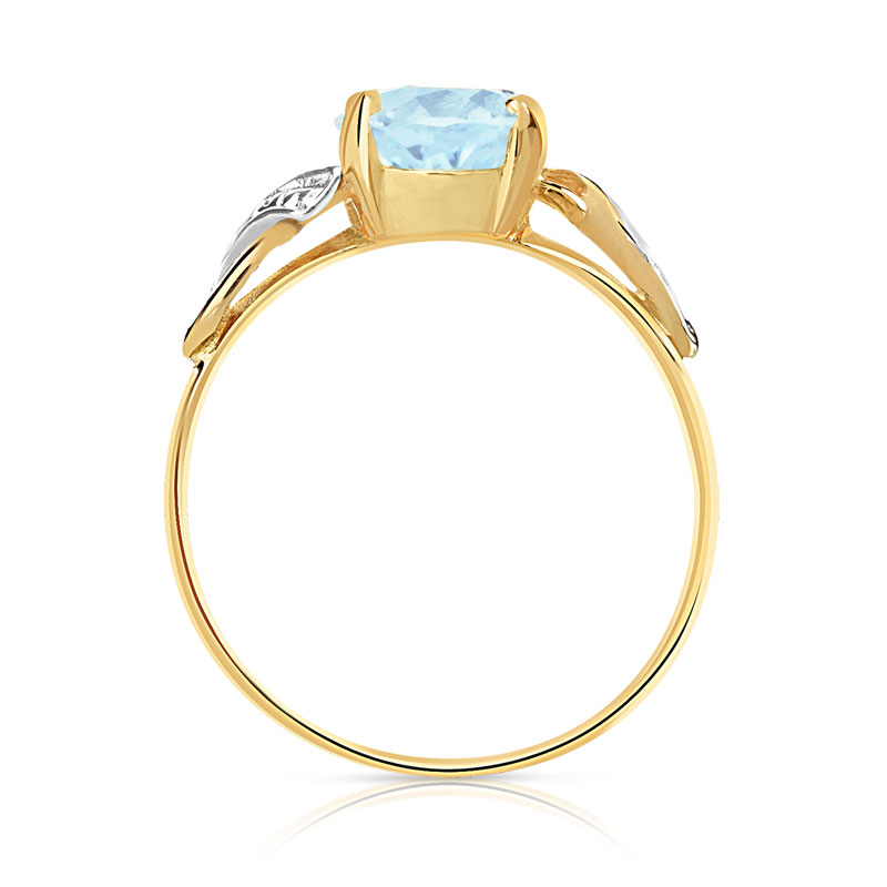 Bague or 750 2 tons topaze bleue traitée