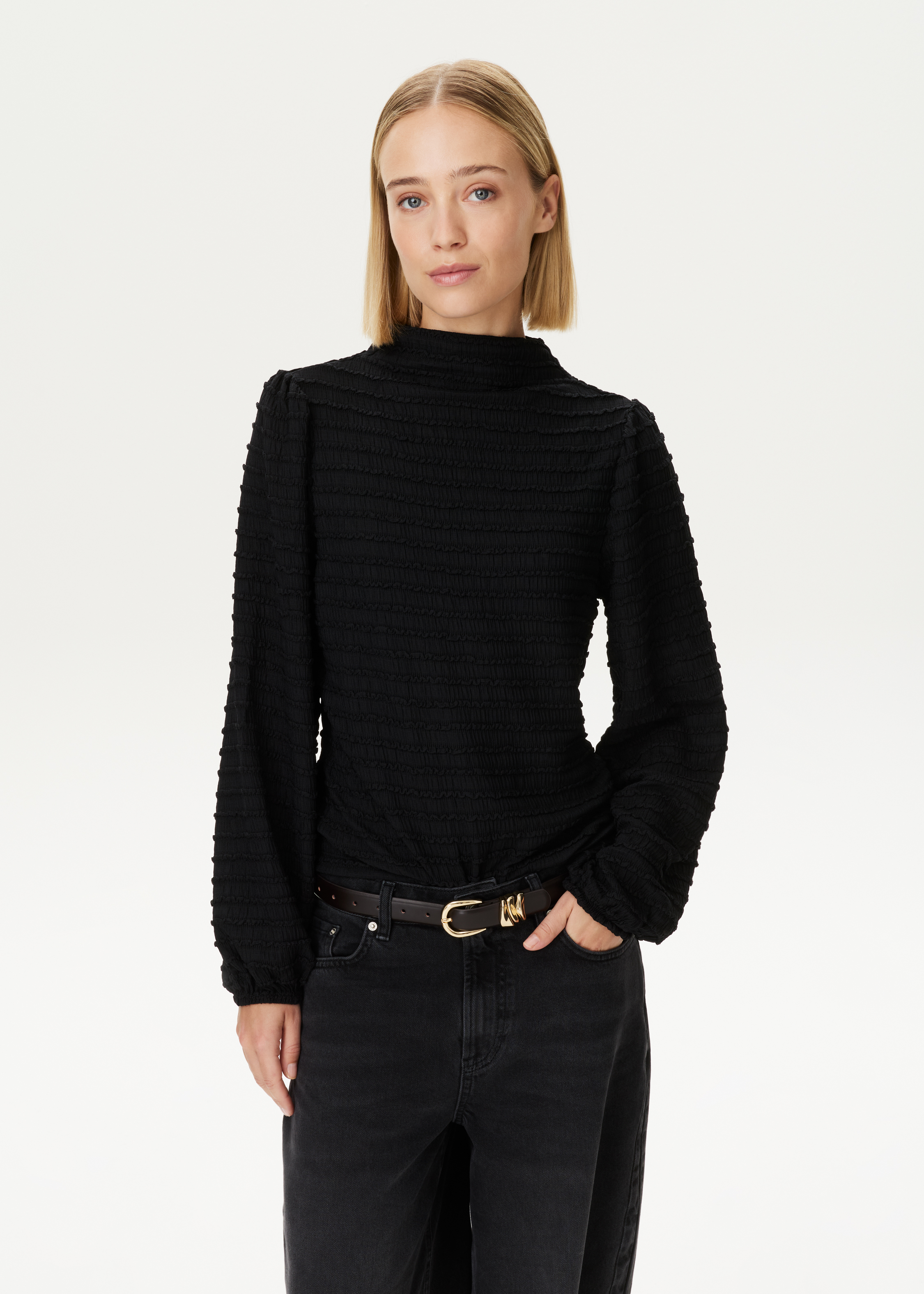 Top met ruffle structuur