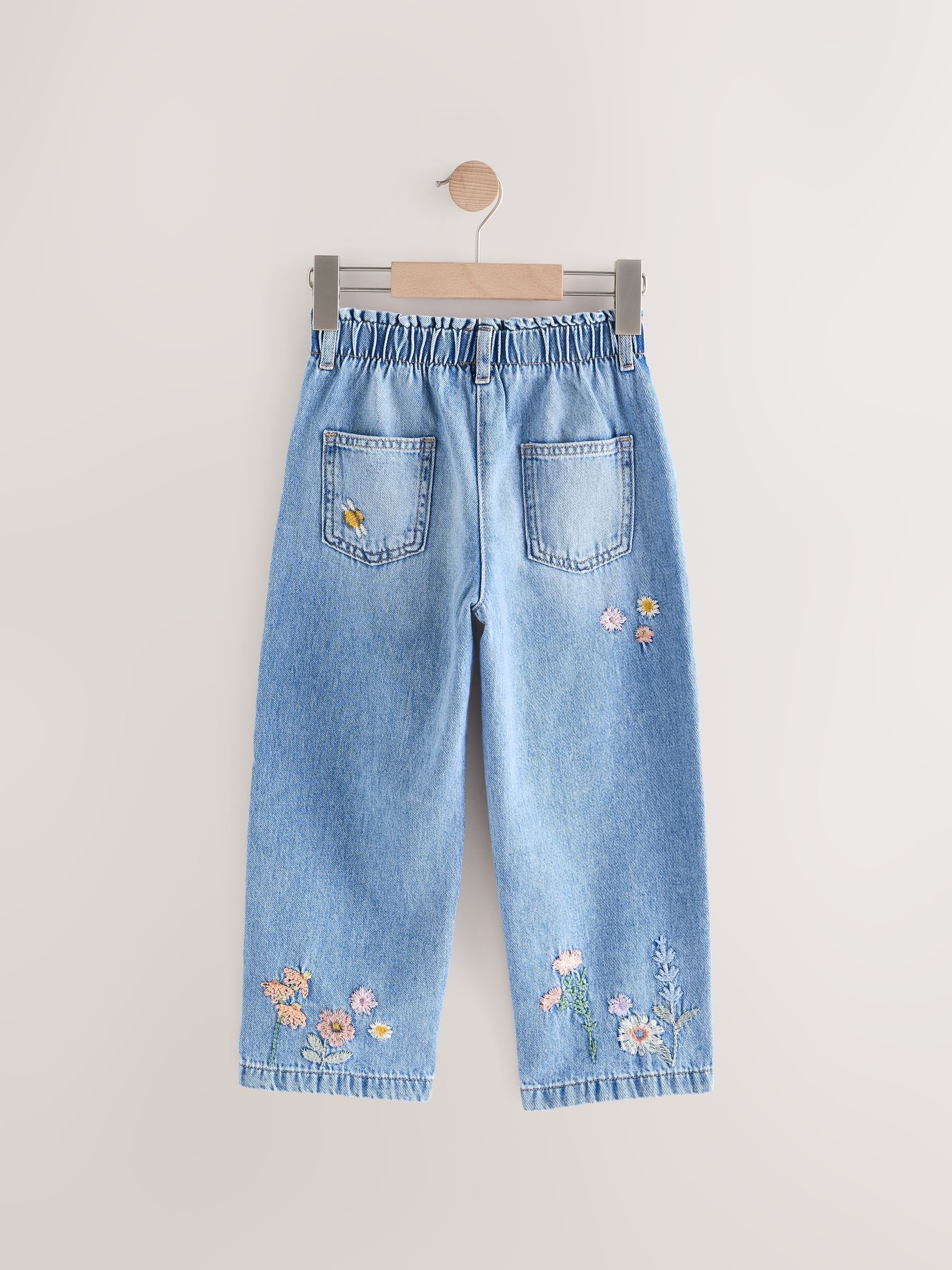 Denim - Jeans met toelopende pijpen en geborduurde bloemenprint (3mnd-7jr)