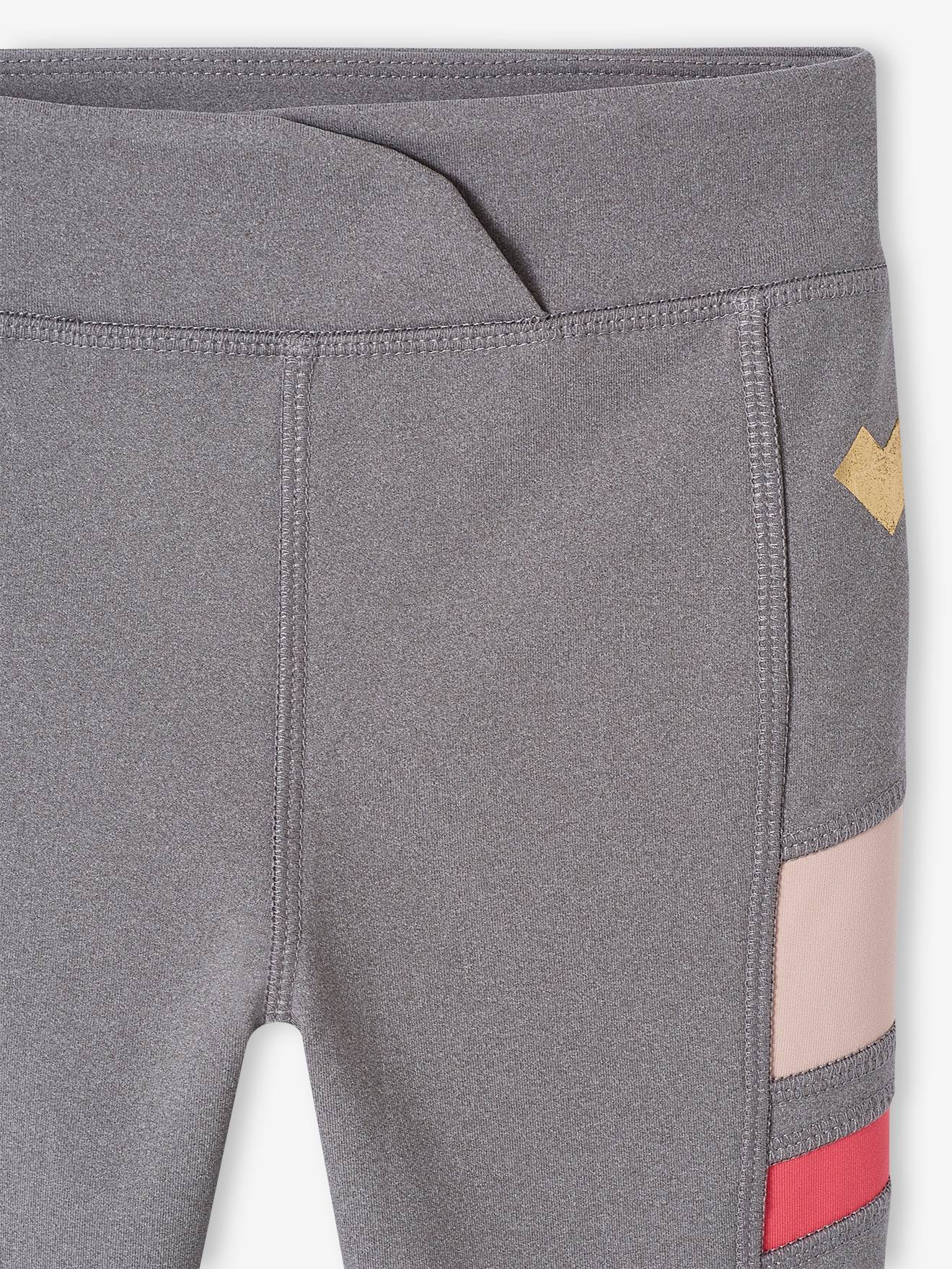 Leggings esportivas azul-marinho em tecido técnico com detalhes sofisticados para meninas.