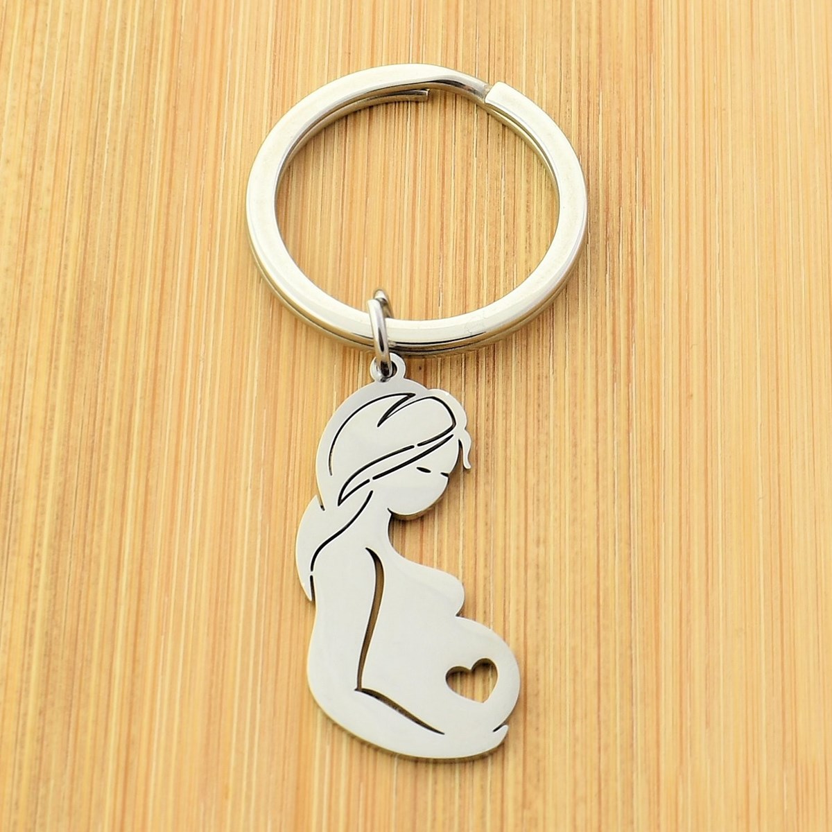 Porte-clés femme enceinte coeur argenté