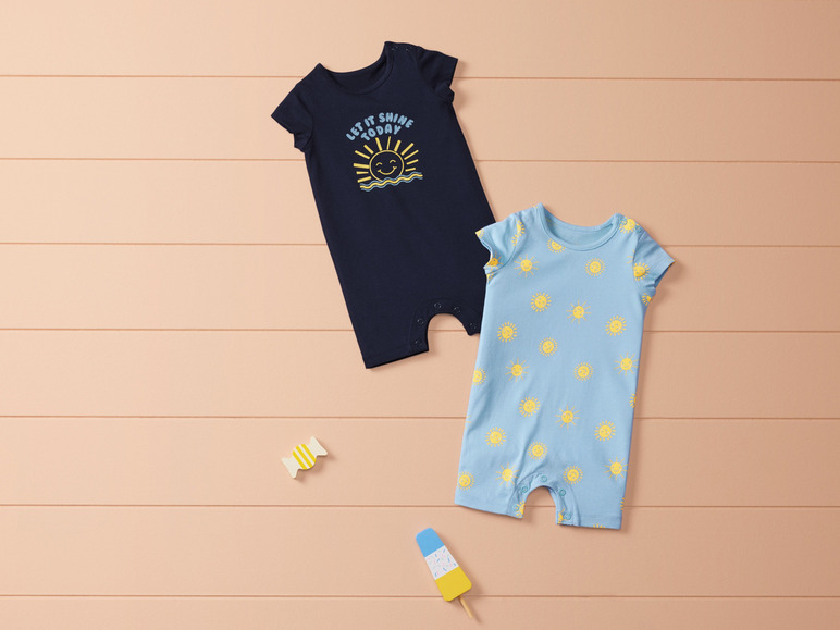 2 baby playsuits