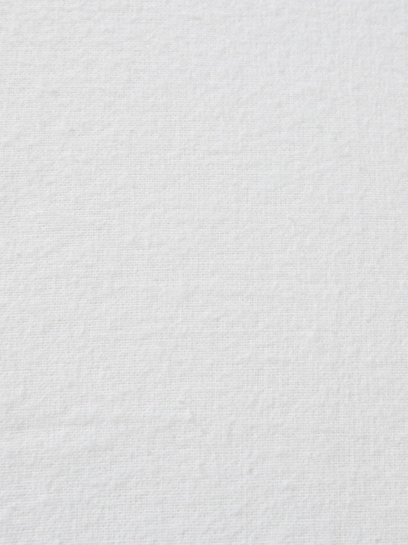 Capa protetora de pelúcia, feita de algodão orgânico branco.
