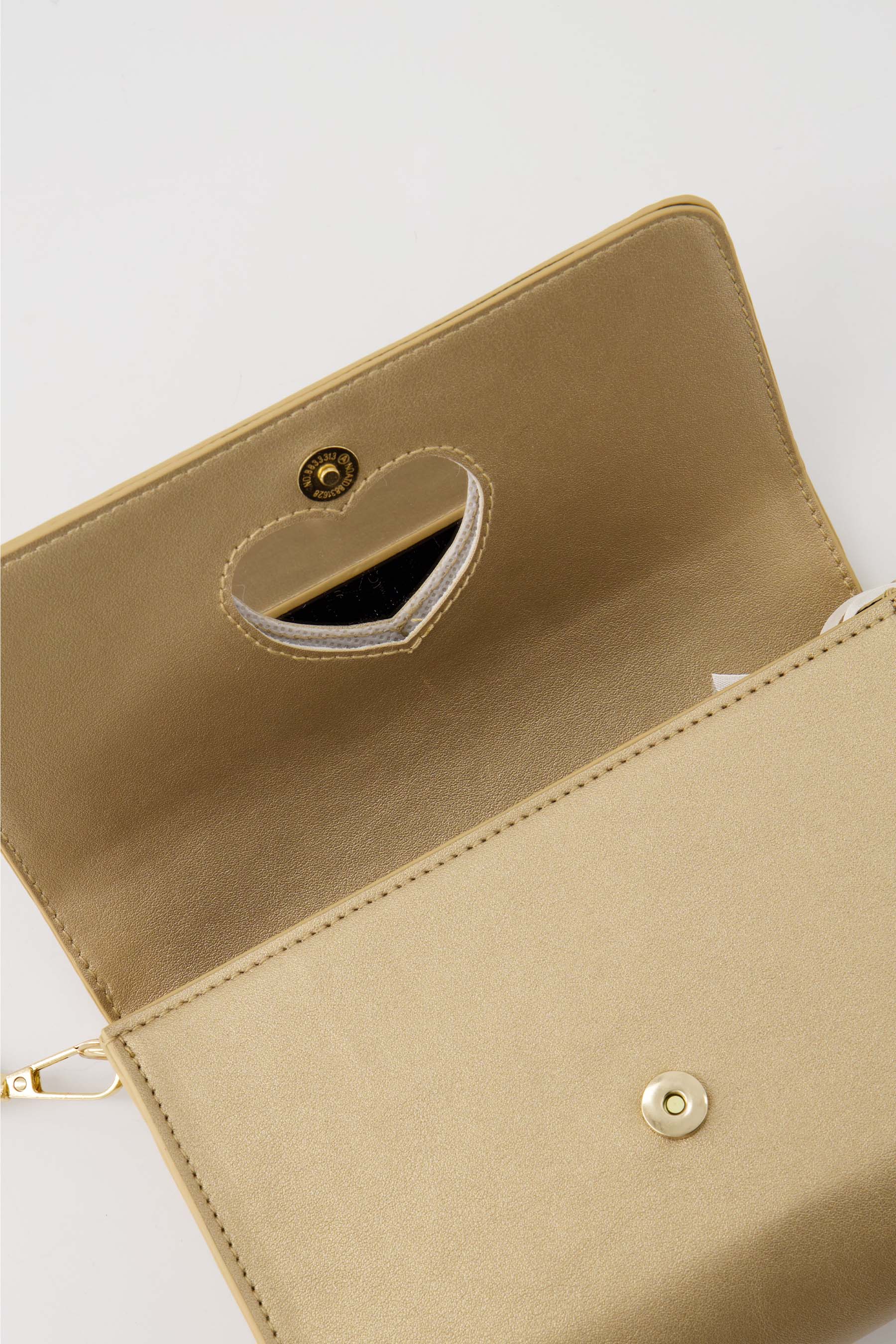 clutch met hart spiegel